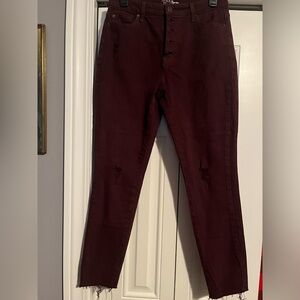 Burgundy wine colored distressed denim